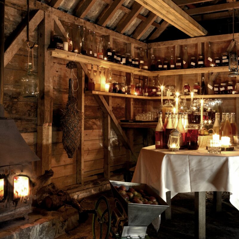 Long barn table with drinks on table