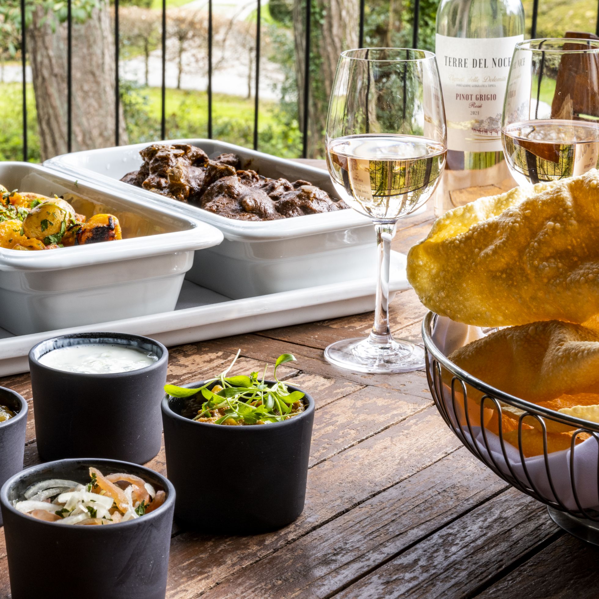 Table with a variety of food and drinks