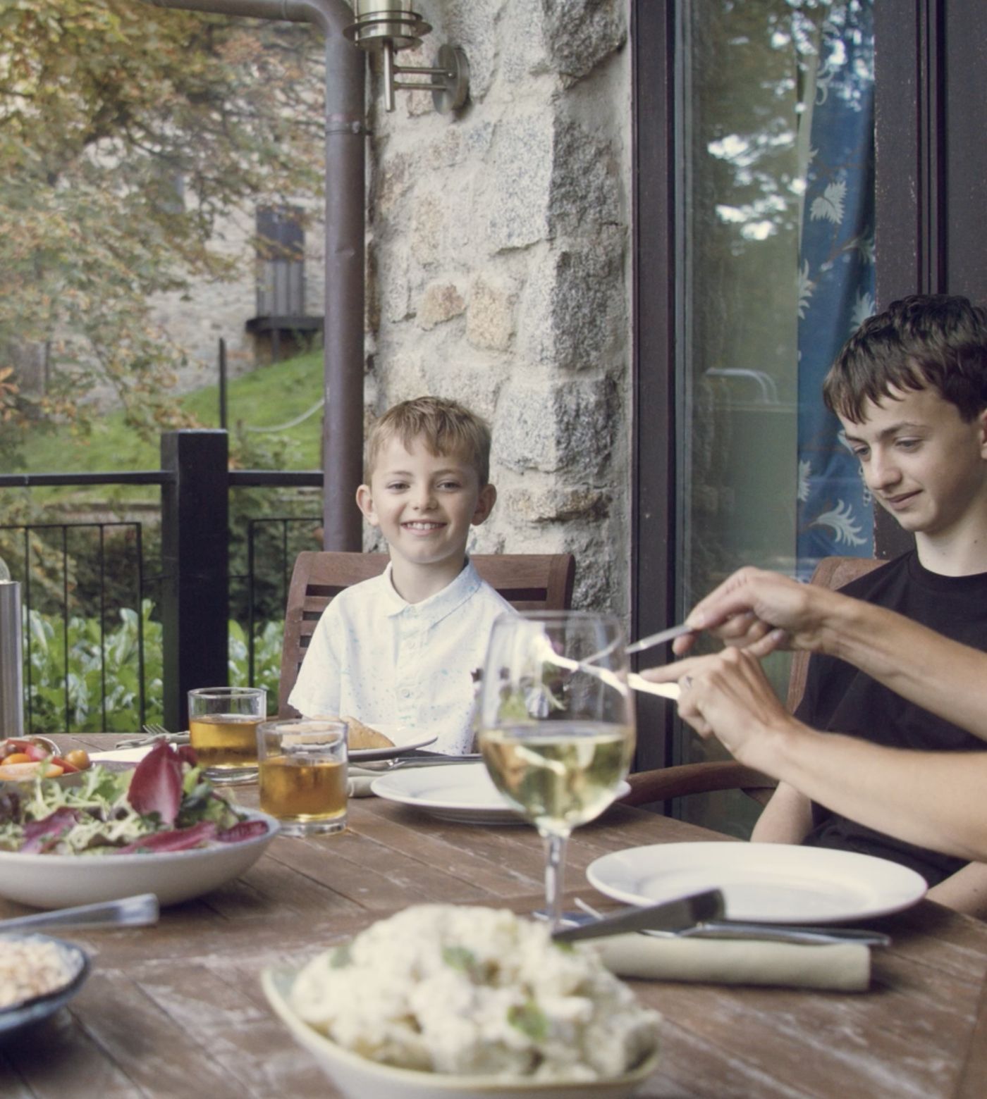 Family friendly meal around table 