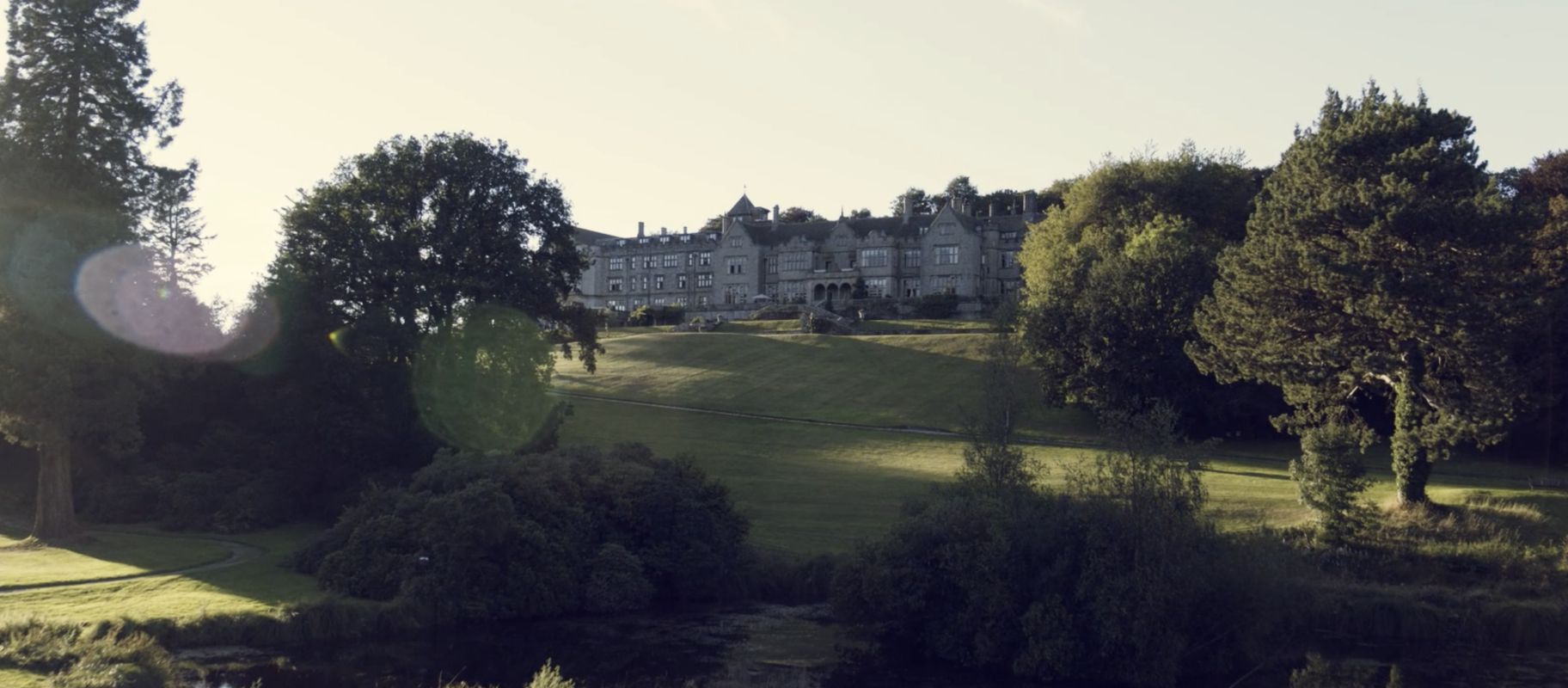 Putting Green and long distance view of Bovey Castle