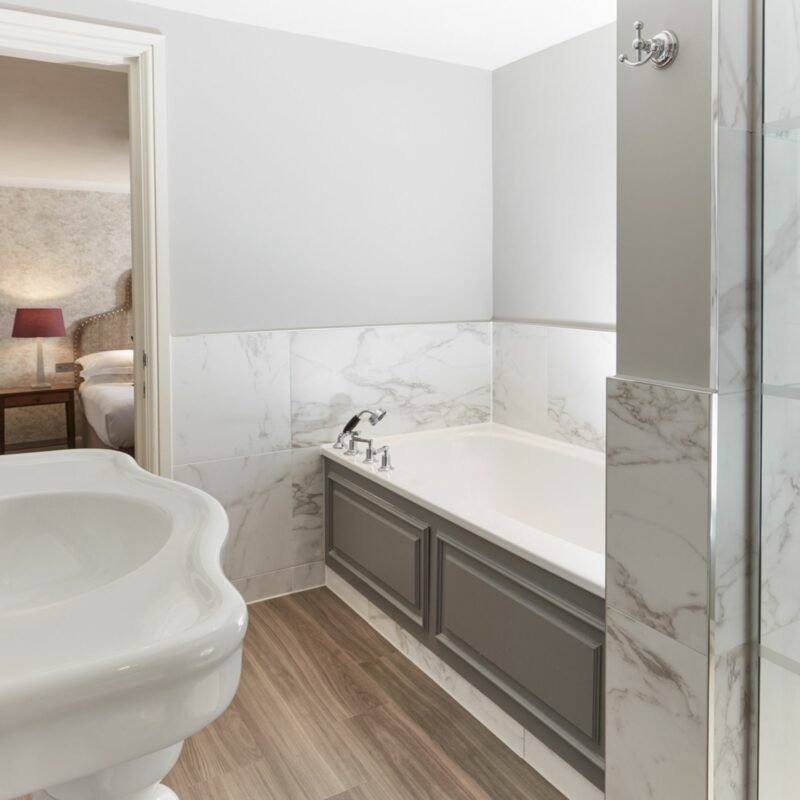 Castle room bathroom with sink and bath