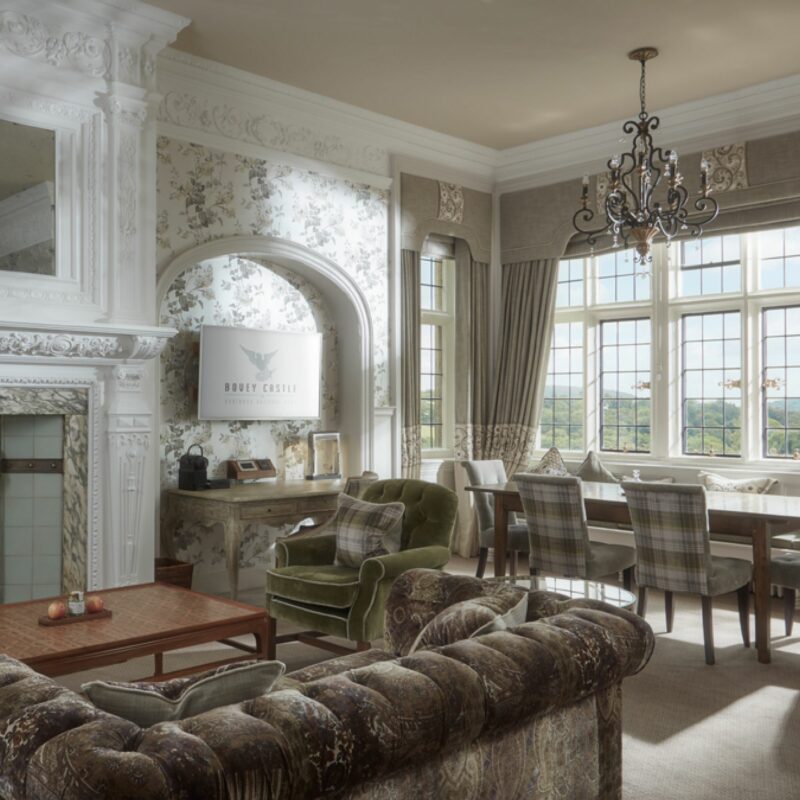 Grand State sitting room with furniture and TV